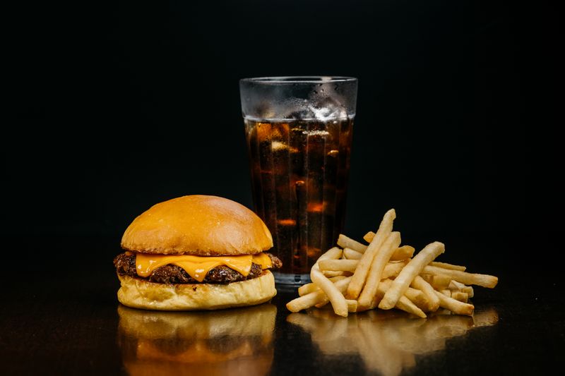 Classic beef burger with lettuce tomato and fries