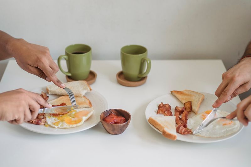 Breakfast burrito with eggs bacon and salsa