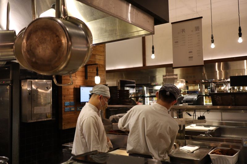 Chuys kitchen team preparing giordanos inspired comfort food